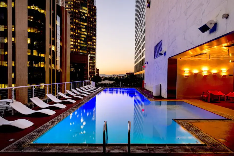 White Sunlounges Beside Pool