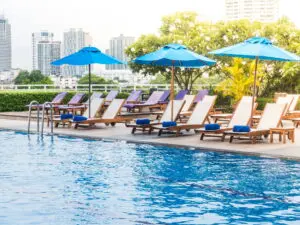 Calm pool with deck chairs