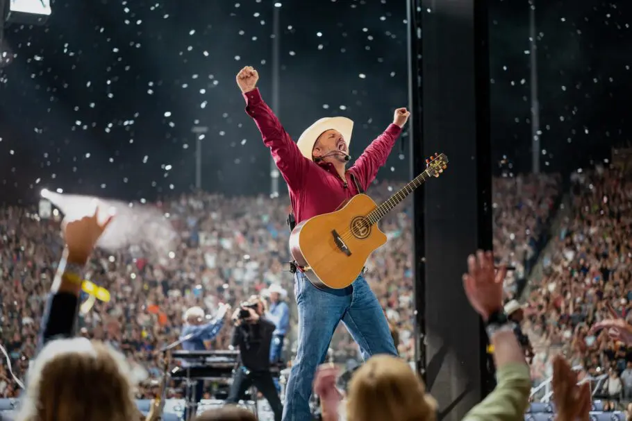 Garth Brooks performing live on stage during a concert