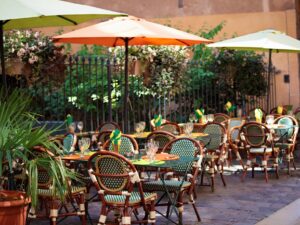 Typical french restaurant scene of tables and chairs