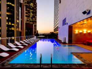 White Sunlounges Beside Pool