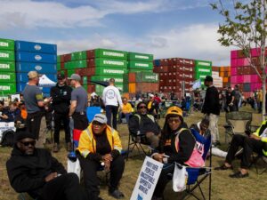 Dock workers receiving support from other unions during the protest